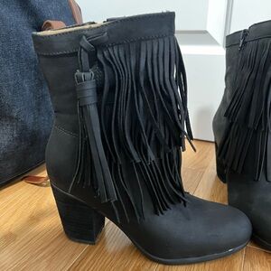 Black booties with fringe detail